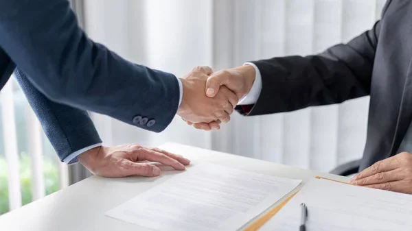 depositphotos_530511362-stock-photo-law-concept-solicitor-businessman-shaking