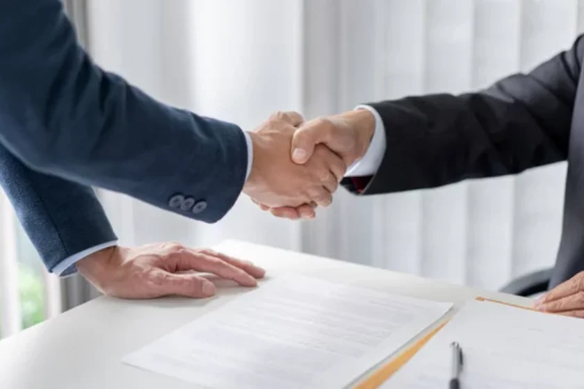 depositphotos_530511362-stock-photo-law-concept-solicitor-businessman-shaking